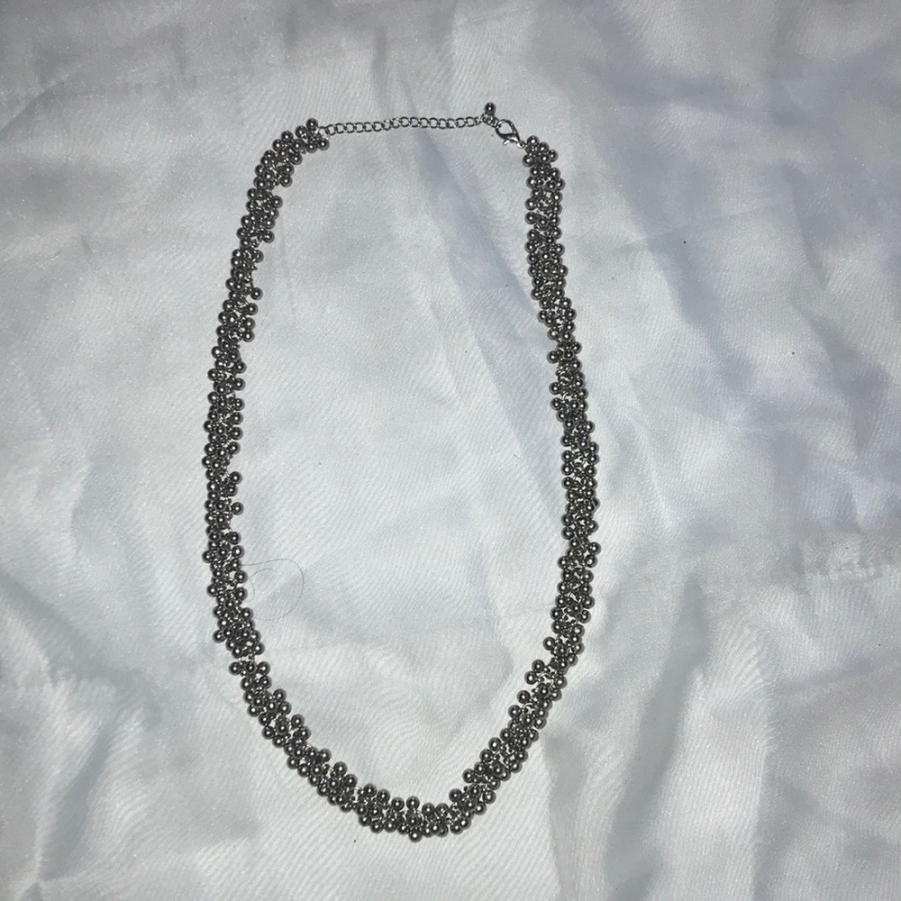 Necklace 24 inches long plus a 3 inch extender